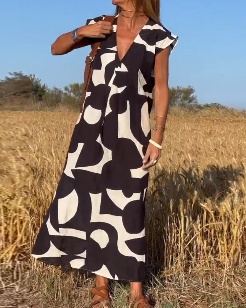 SITA - VESTIDO IMPRESO CON CUELLO EN V