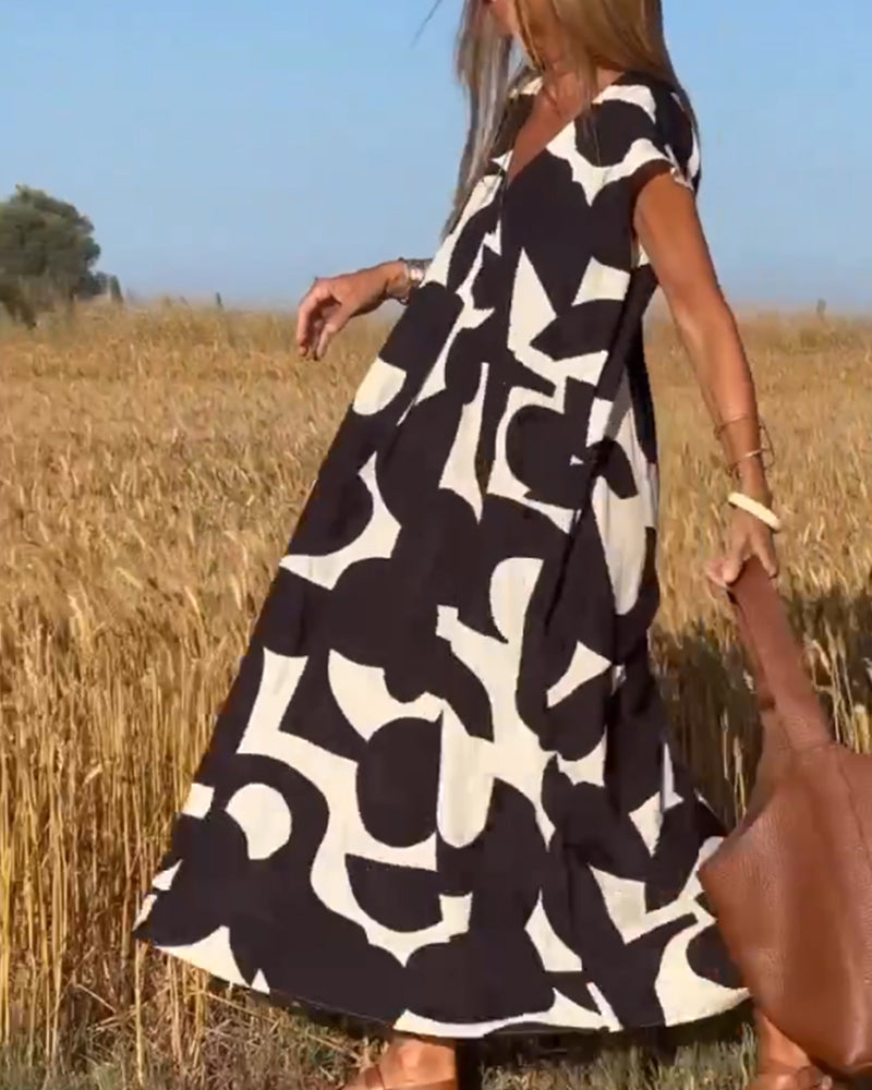 SITA - VESTIDO IMPRESO CON CUELLO EN V