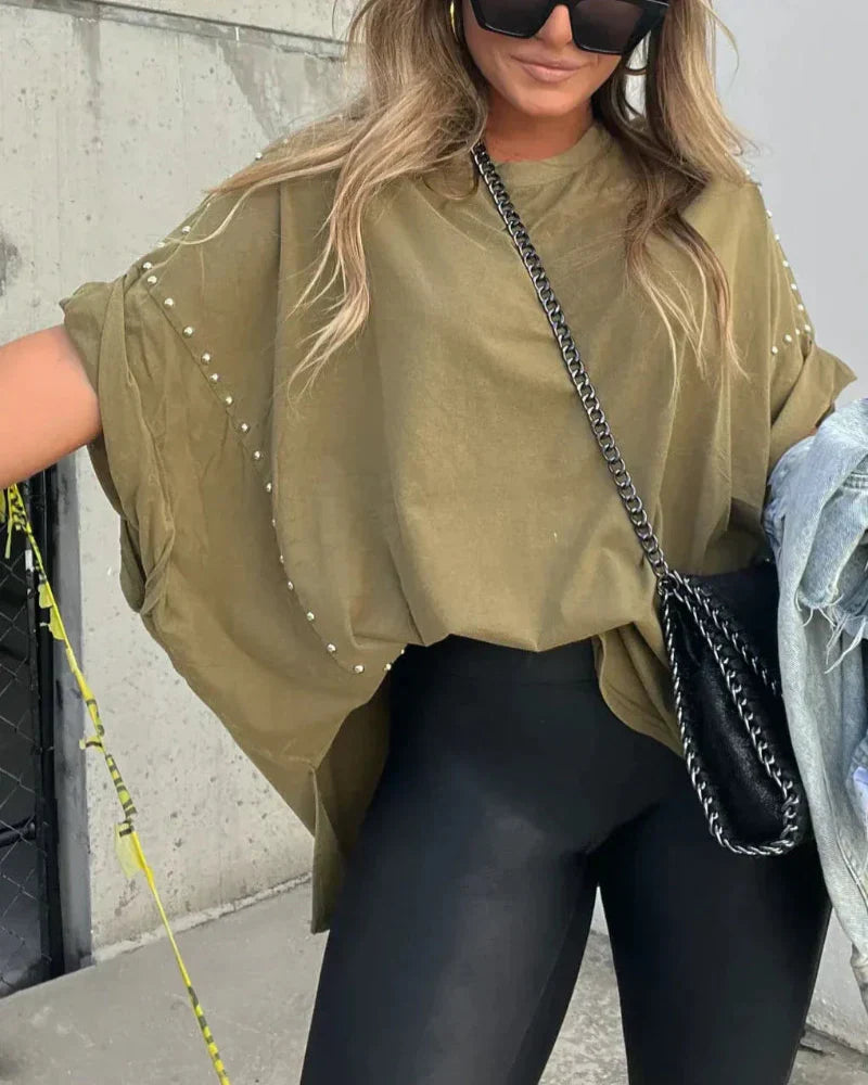 BELLA - CAMISETA OVERSIZE CON CLAVIJAS